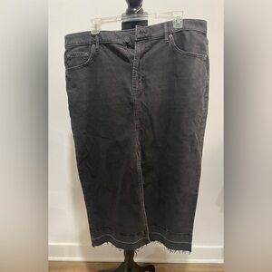 Cute Gap Jean Skirt with front slit and pockets.